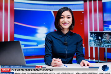 Asian reporter presents new island appearance on television show, rare natural events occured on...
