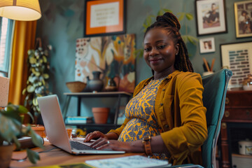 Fototapeta na wymiar Happy Professional Pregnant Black Woman Working on Laptop Working from Home Remote