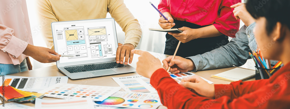 Poster cropped image of interior designer team discuss the material color while laptop displayed website wi