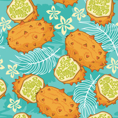 Kiwano fruit seamless pattern on a blue background with exotic leaves and flowers. Perfect for wallpaper, food wrapping paper, fabric, background etc