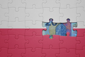 puzzle with the national flag of poland and euro banknote. finance concept