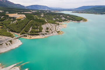 Fototapeta premium Aerial view of Yesa reservoir by Tiermas in Spain, Summer 2023