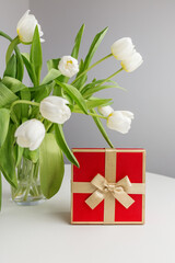 Red Gift Box and White Tulips on White Table