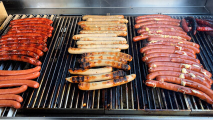 Sizzling Sausages on Barbecue Grill