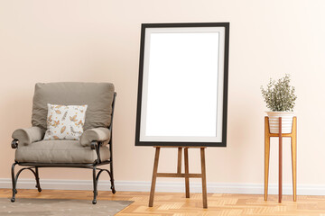 Easel wooden photo display holder stand, next to sofa and wooden stand with matte vase