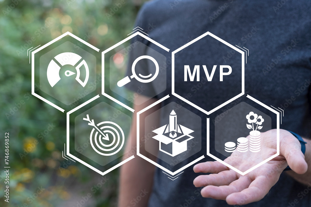 Poster man using virtual interface sees abbreviation: mvp. minimum viable product ( mvp ) business concept 