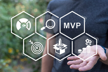 Man using virtual interface sees abbreviation: MVP. Minimum Viable Product ( MVP ) Business concept...