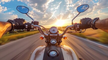 Motorcyclist s point of view  riding a motorcycle at high speed on a highway during sunset - obrazy, fototapety, plakaty