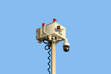 Mobile CCTV crime prevention surveillance camera unit with blue sky