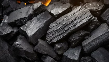 Foto auf Acrylglas Brennholz Textur Black coal texture background. close up