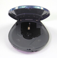 Open CD player. Portable CD player 90s. Spaceship CD player. 90s aesthetic.