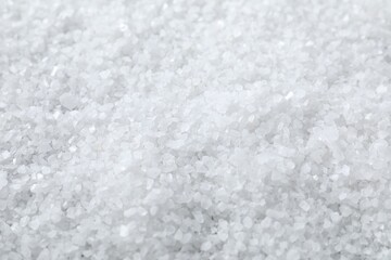 Fototapeta na wymiar White natural salt as background, closeup view