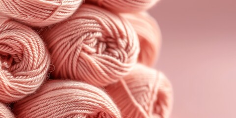 Pink yarn balls on a light background