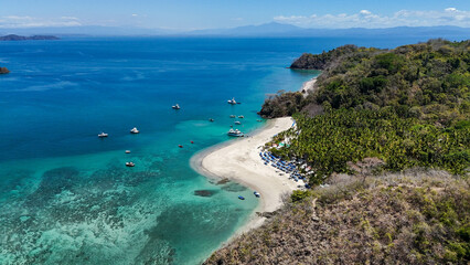 Drone aerial view of Isla Tortuga, tropical paradise beach island in Costa Rica central america Nicoya peninsula