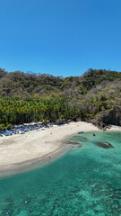 Drone aerial view of Isla Tortuga, tropical paradise beach island in Costa Rica central america Nicoya peninsula