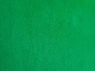 For the design background green corrugated cardboard texture background. Green paper cardboard with soft color. Green corrugated cardboard texture is useful as a background.