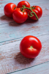 Red tomatoes on the vine