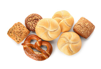 Different delicious buns and pretzel on white background