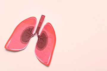 Paper lungs on beige background