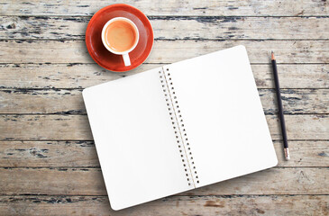 Top view with glasses and notebook on wood table background in office workplace.