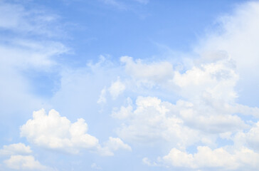 Naklejka na ściany i meble cloudscape with white clouds and blue sky