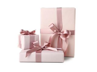 Gift boxes with pink bows on white background. International Women's Day