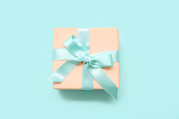 Gift box on blue background. International Women's Day