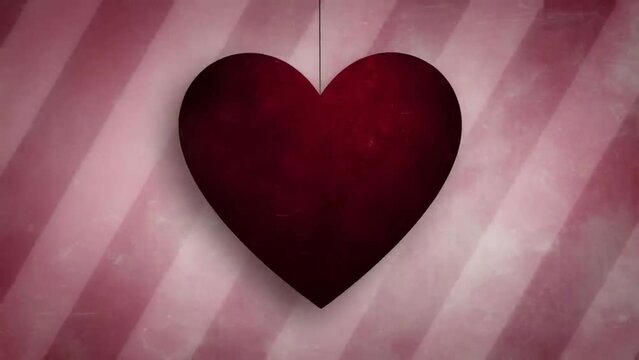 Big red heart hanging, line background image moving slowly to the right.