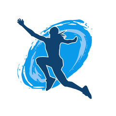 Silhouette of a slim female jump pose. Silhouette of a casual woman jumping