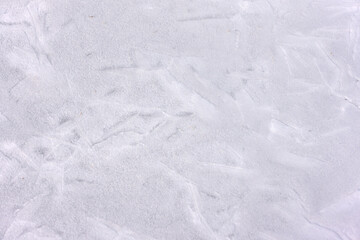 Frozen surface texture background in winter