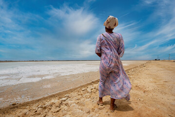 Manaure, Guajira, Colombia. March 4, 2020: Woman walking in the Salinas de Manaure