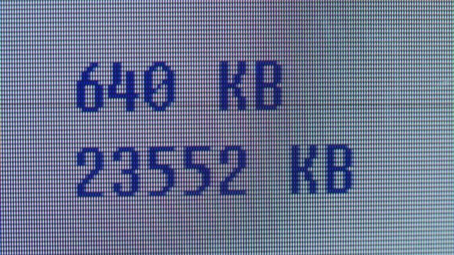 Pixel on old vintage computer monitor close-up. Memory information of pc. Desktop vintage retro wave display, late 90s PC.