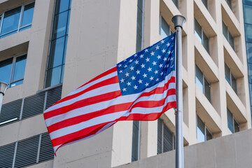 American flag and Modern buildings in the metropolis