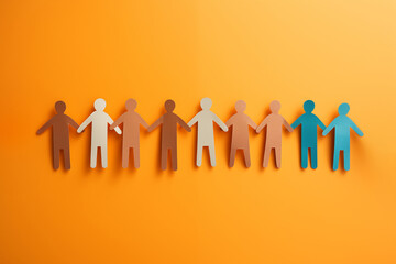 Community, Diversity and Inclusion concept, paper people holding hands together on yellow background. Business team. Multi cultural society group.