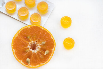 cough sore throat pastille extract orange fruits arrangement flat lay style on background white