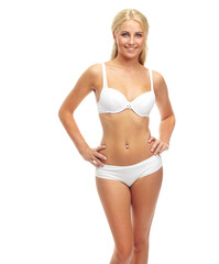 Obraz premium Portrait, smile and underwear with body of woman in studio isolated on white background for feminine health. Skincare, weight loss and wellness with confident young model looking proud of diet