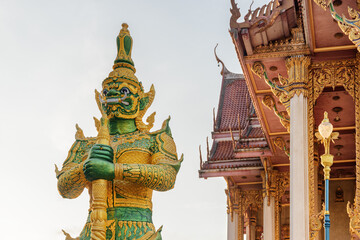 Fototapeta na wymiar Amazing statue at Wat Don Mueang in Bangkok, Thailand