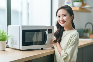 Fototapeta na wymiar Smiling woman poses next to a microwave oven. Fictional Character Created By Generated By Generated AI.