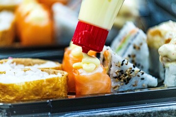 Sushi being made