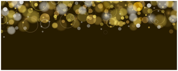 ゴールドのキラキラ輝くきらめき玉ボケ