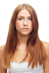 Fototapeta premium Portrait, beauty and hair with redhead woman in studio isolated on white background for keratin treatment. Face, salon or skincare and natural young person with shampoo or conditioner for haircare