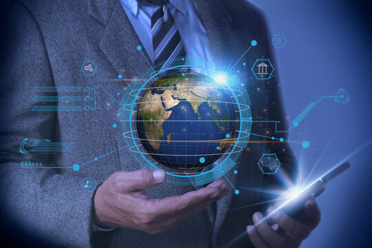 Businessman using smartphone and holding Global network connection, AI and internet of things on 6G network wireless systems concept. Big data analytics and business intelligence