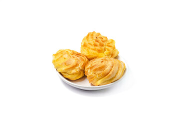 Soes Cake also known as Choux Pastry displayed on a plate