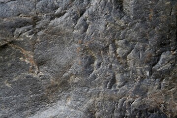Gray granite background. Dark gray and black slate background or texture. geology