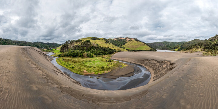 Black sand dunes of New Zealand's Waitakere Ranges, towering giant sand dune at Lake Wainamu