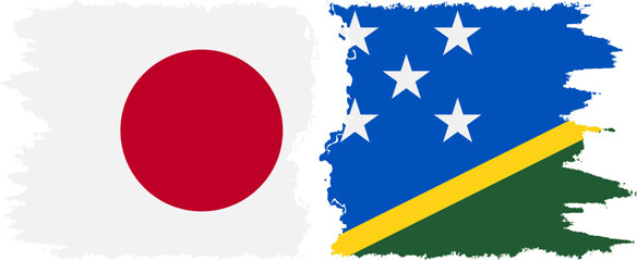 Solomon Islands and Japan grunge flags connection vector