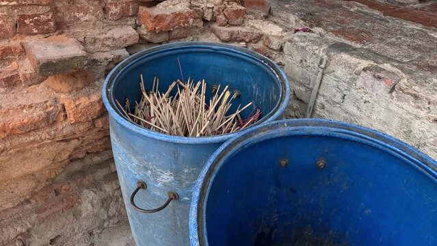 Bucket of Sticks Emptied Gradually