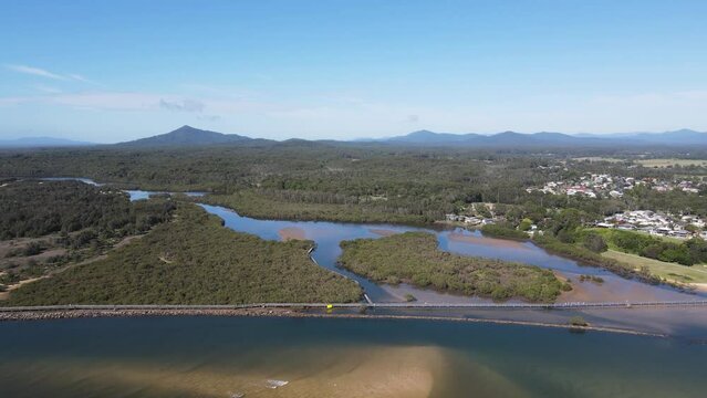 Aerial views of Urunga boardwalk with stunning views of the Great Dividing Range and Urunga township.