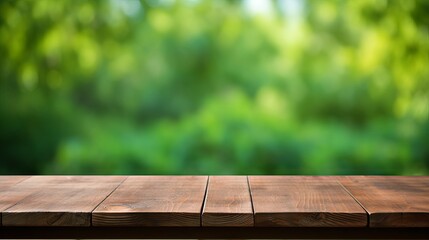 Wooden table with green bokeh background for product display or food photography - obrazy, fototapety, plakaty
