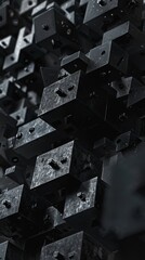 A dark, close-up view of a geometric block structure with robotic elements, forming a domino-like pattern in 3D